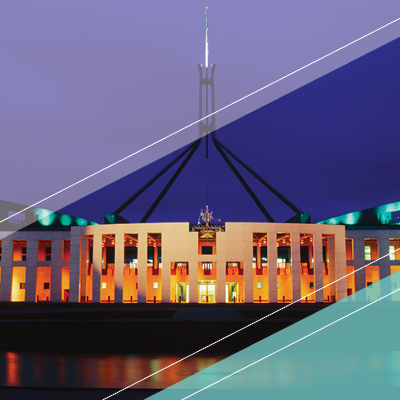 An image of Australia's Parliament House at night.