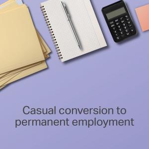 Image of desk with text saying casual conversion to permanent employment