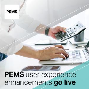 A person working on a laptop and calculator at a desk.